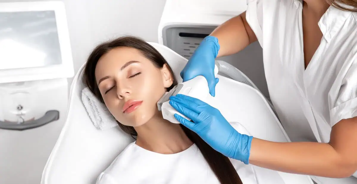 Woman receiving IPL laser hair removal treatment for smooth, long-lasting hair reduction.