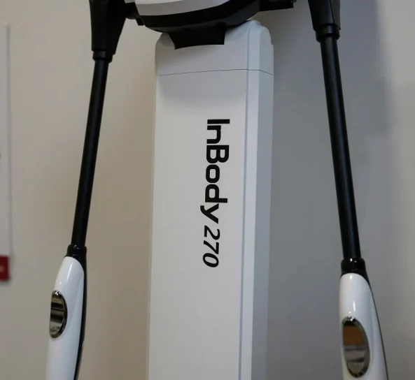 Skin tightening treatment with radio frequency device on neck.