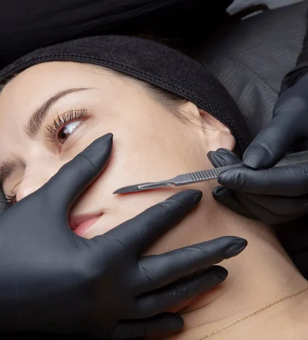 Aesthetician performing cheek filler in Oklahoma City, OK