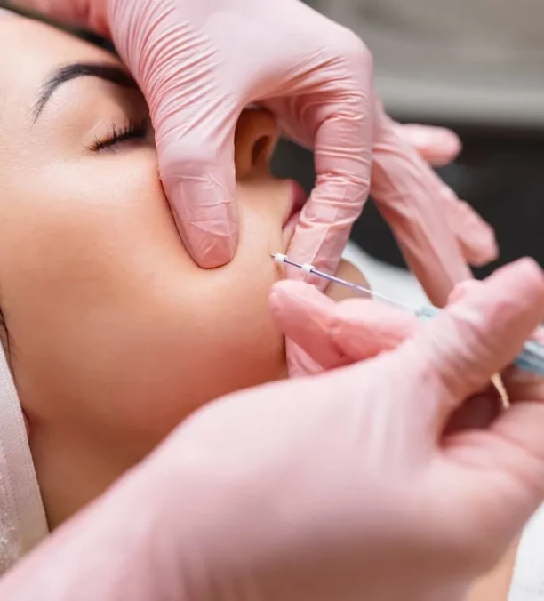 Closeup of woman receiving HydraFacial for skin rejuvenation.