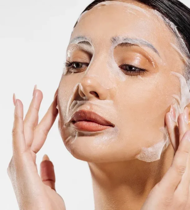 Skincare expert performing facial injection procedure.